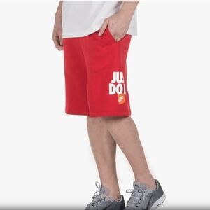 Nike Just Do It  Men's Fleece Shorts in red. Size M